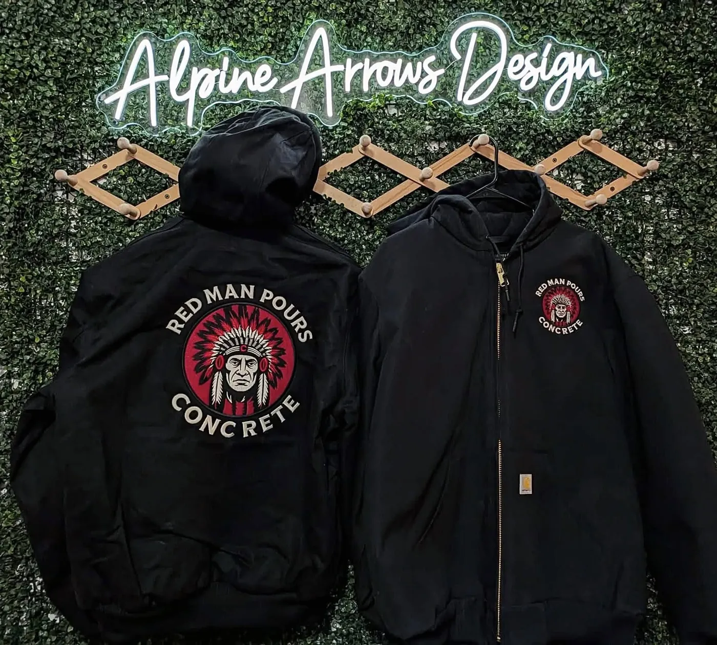 Embroidered hooded work jacket with a concrete company logo, custom commercial embroidery